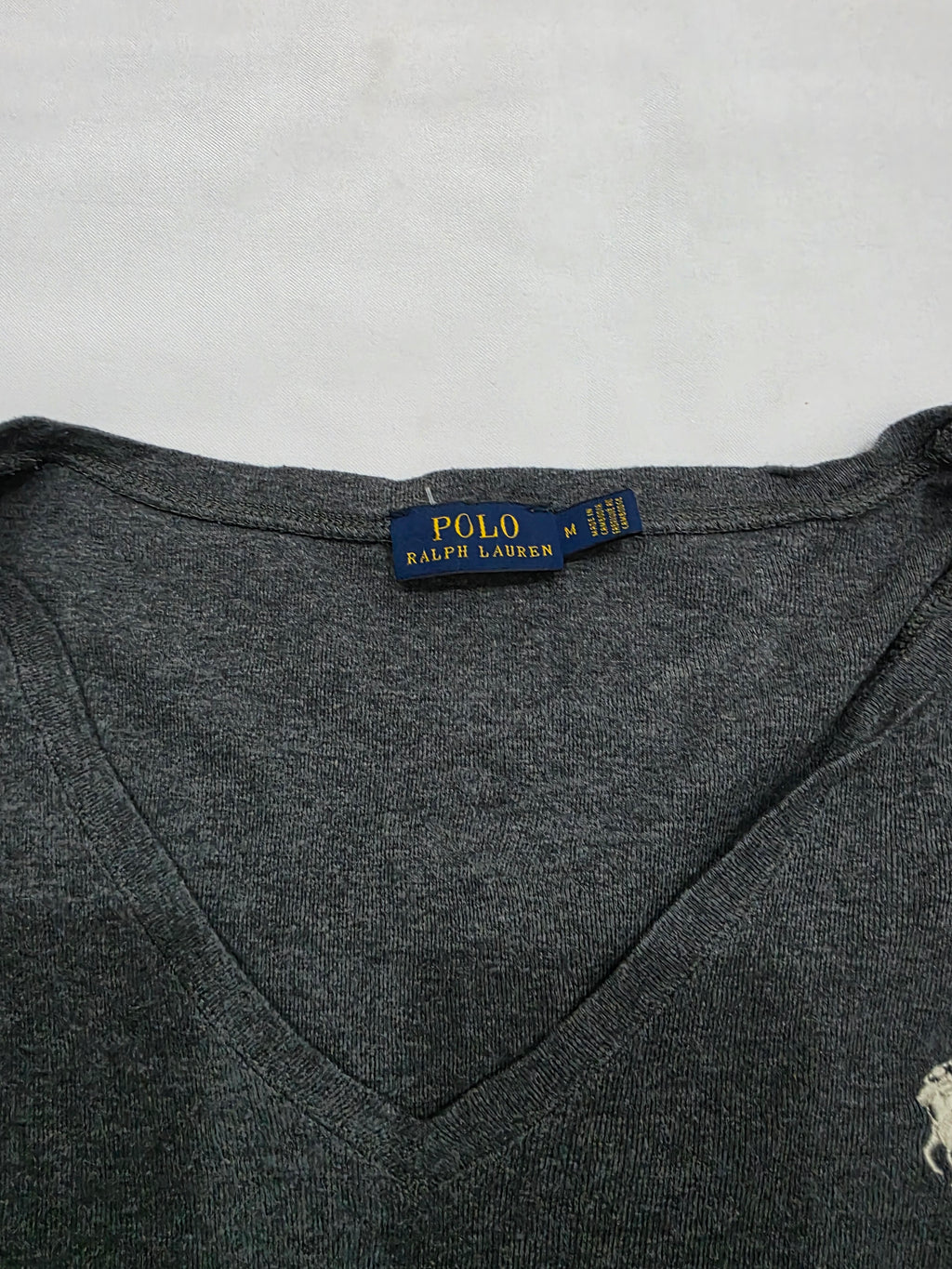 Playera Polo Ralph Lauren gris manga larga poni blanco