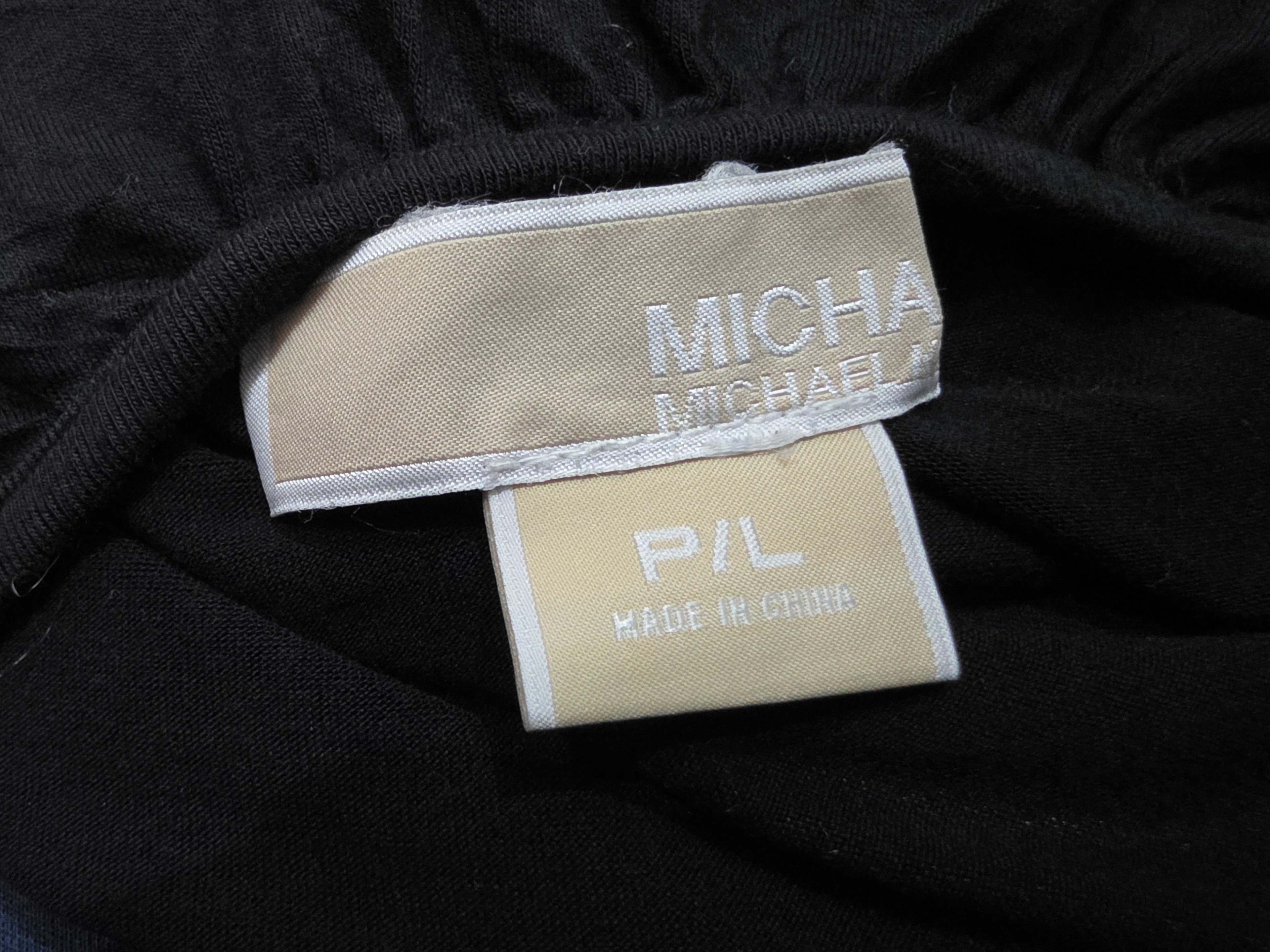 Blusa Michael Kors campesina color negro de Mujer