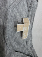 Blusa Michael Kors color gris con olan manga larga