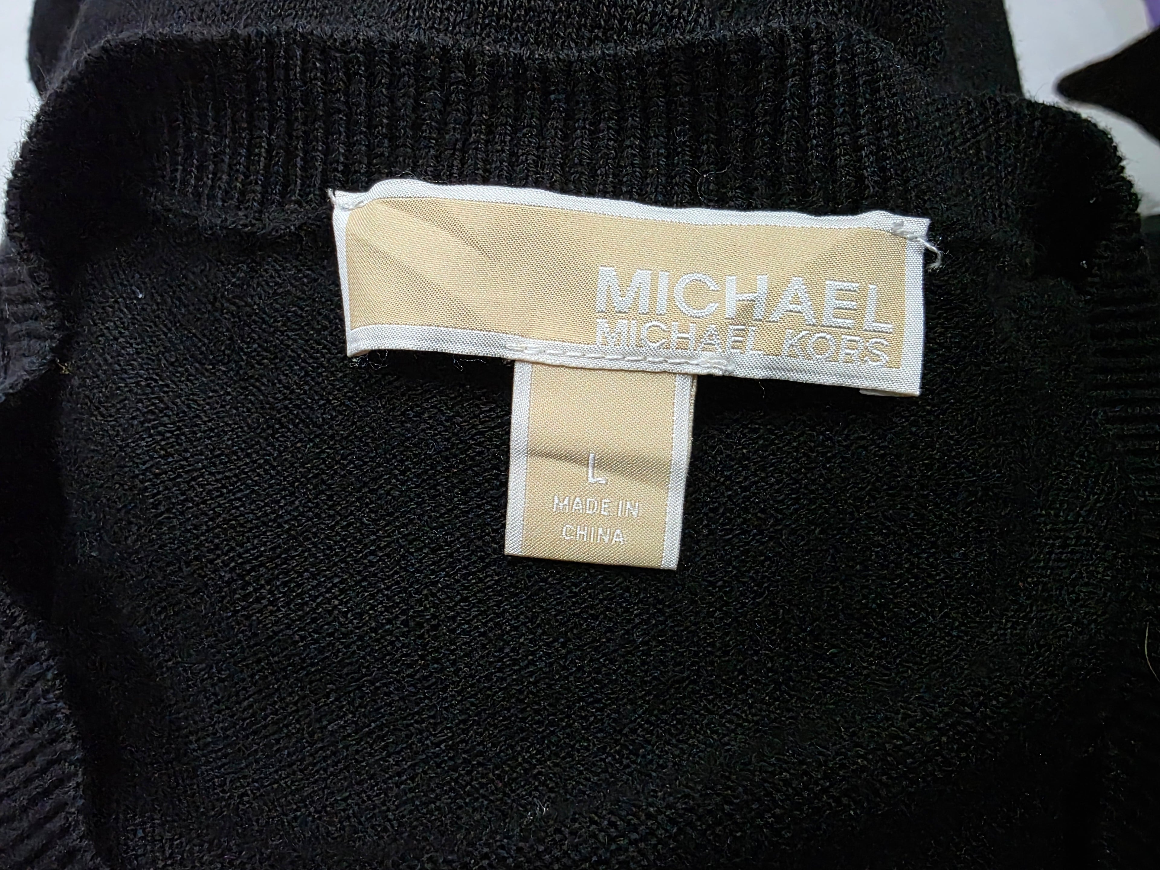 Sueter Michael Kors color negro de Mujer Grande con olancitos