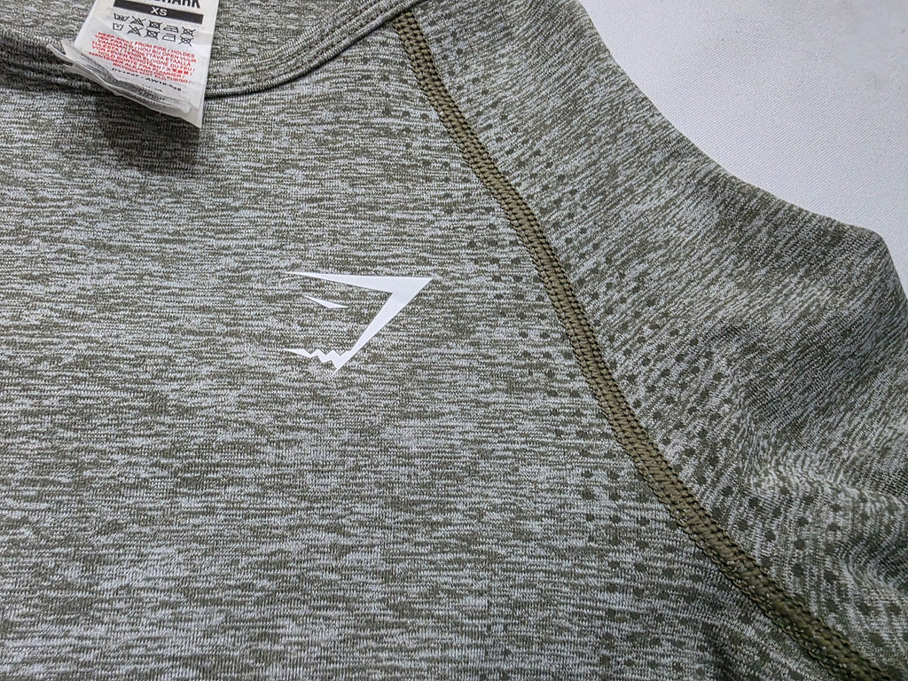 Playera GymShark verde jaspeado Crop Top