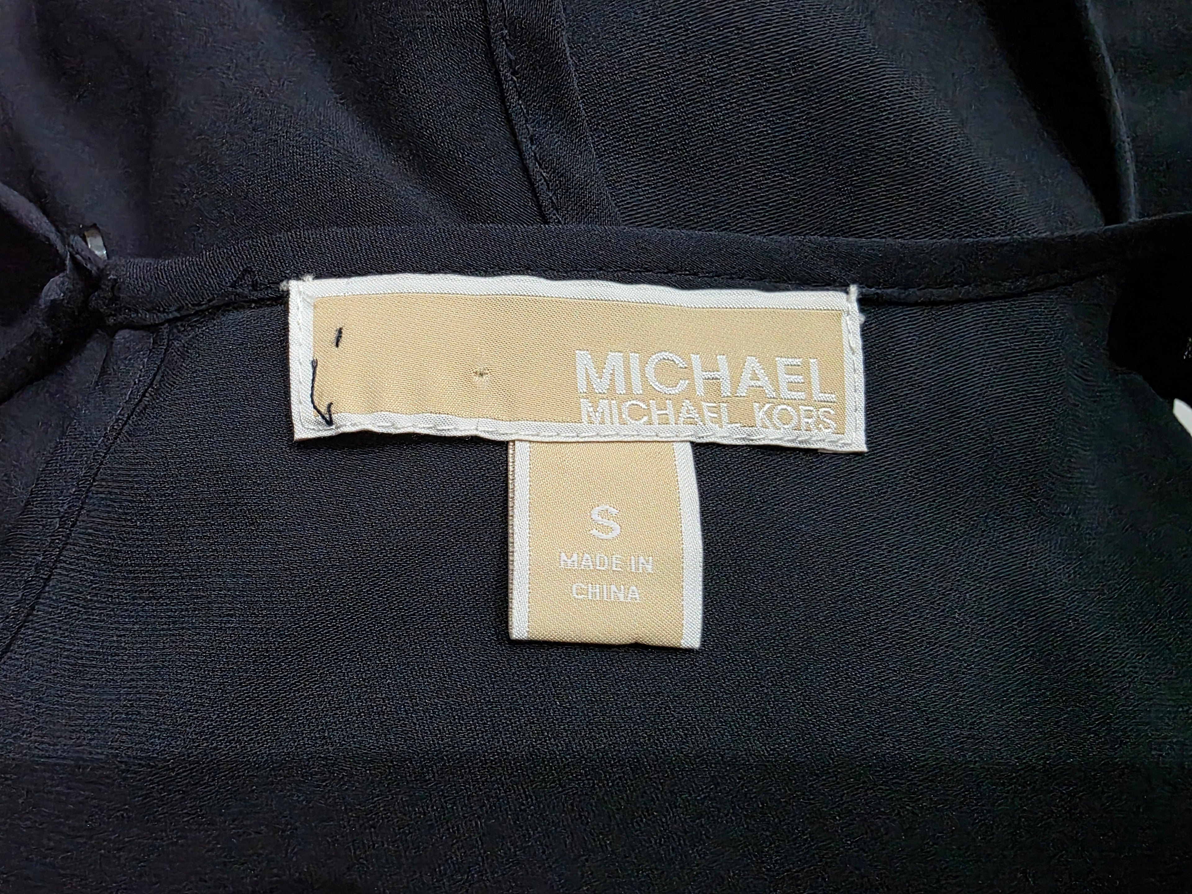Blusa Michael Kors azul profundo espalda descubierta