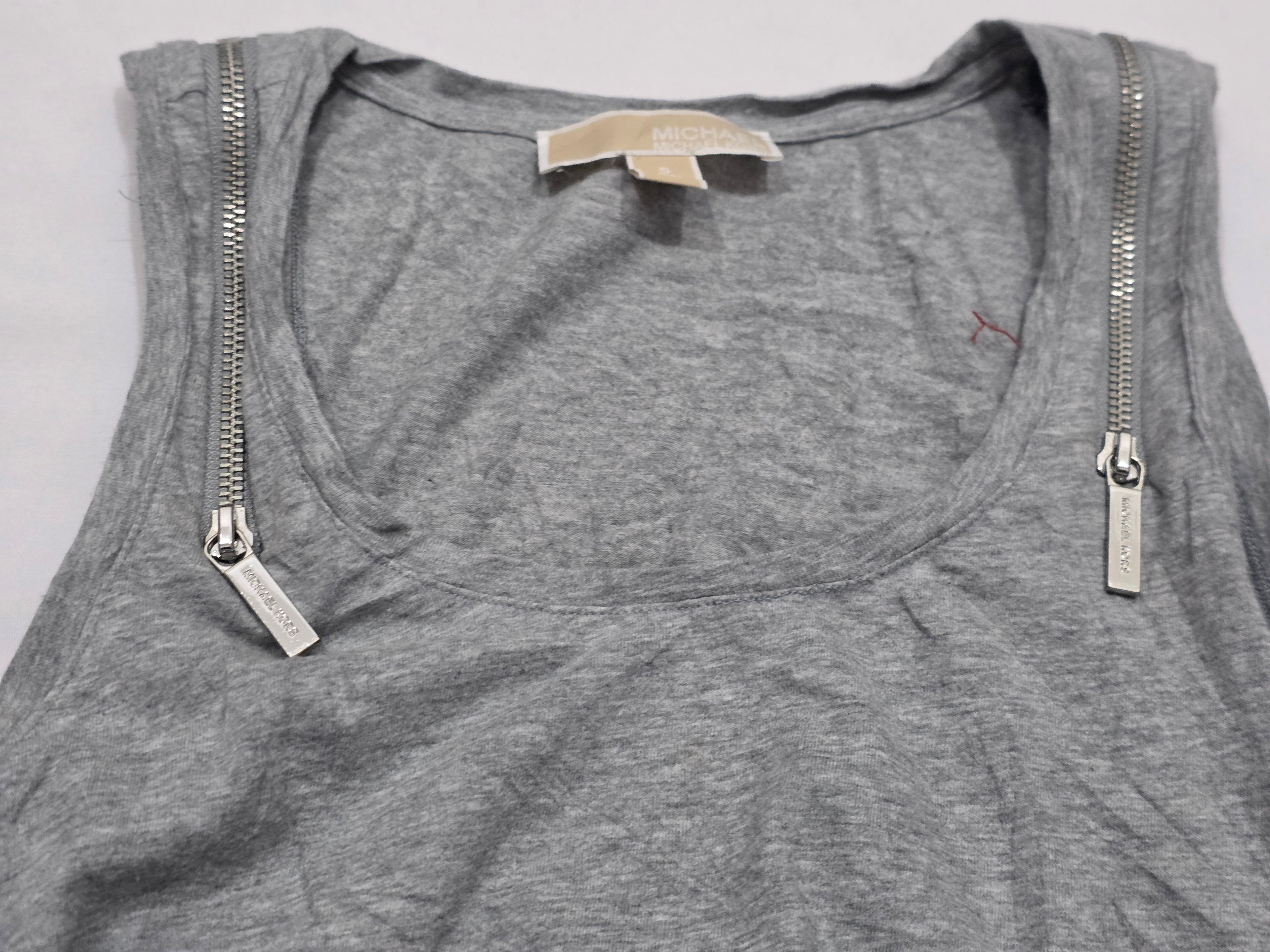 Playera sin mangas Michael Kors de Muker color fris con cierres